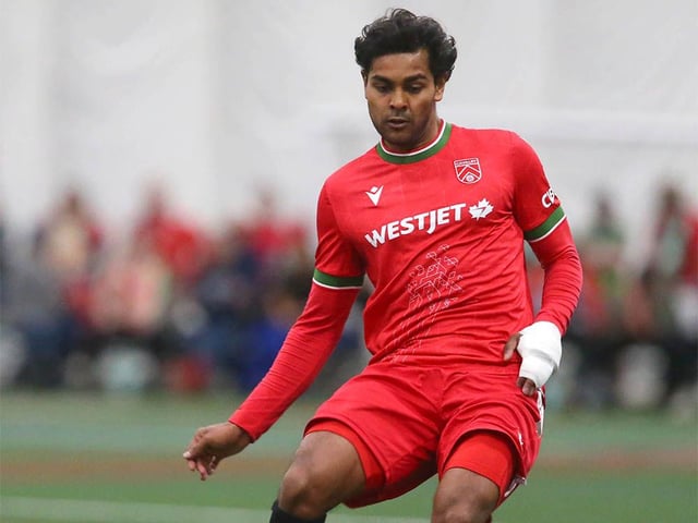 Cavalry FC's Shamit Shome passes during an exhibition pre-season soccer match between Cavalry FC and at Calgary West Soccer Centre in Calgary on Saturday, April 6, 2024.