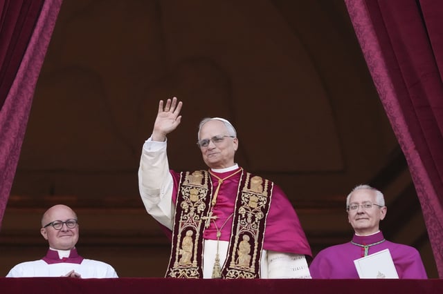Cardinal Robert Prevost appears on the central loggia of St. Peter&#39;s Basilica after being chosen the 267th pontiff of the Roman Catholic Church, choosing the name of Pope Leo XIV, at the Vatican, Thursday, May 8, 2025.