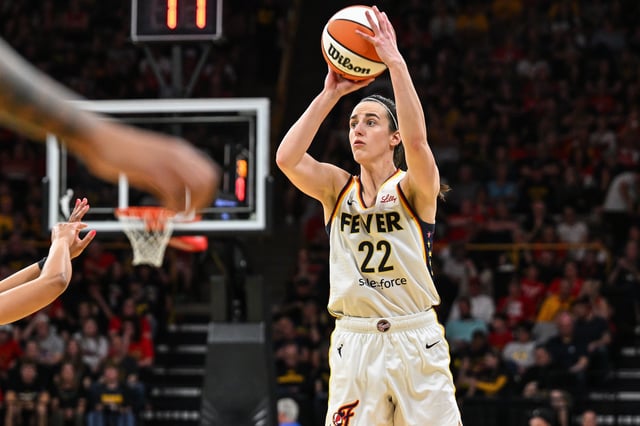May 4, 2025; Iowa City, IA, USA; Indiana Fever guard Caitlin Clark (22) shoots a three point basket against the Brazil National Team during the third quarter at Carver-Haweye Arena. Mandatory Credit: Jeffrey Becker-Imagn Images/File Photo