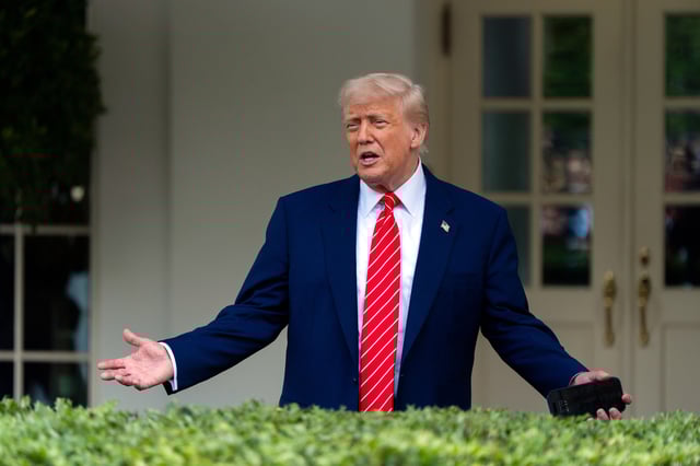 President Donald Trump speaking with reporters in front of the West Wing of the White House, Thursday, May 8, 2025, in Washington.
