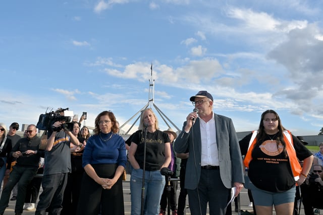 Prime Minister Anthony Albanese addresses a rally calling for action to end violence against women, in front of Parliament House in Canberra, Sunday, April 28, 2024. (AAP Image/Mick Tsikas) NO ARCHIVING