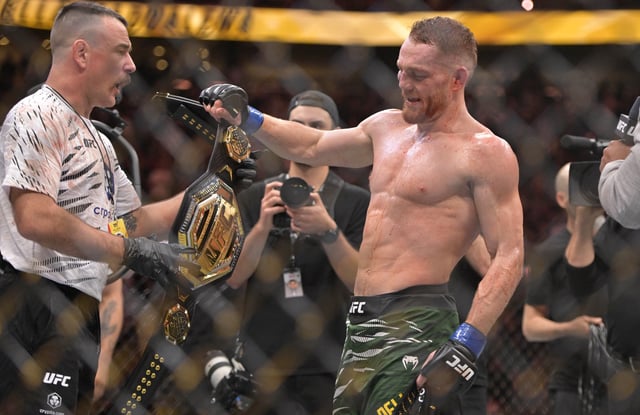 May 10, 2025; Montreal, Quebec, CANADA; Jack Della Maddalena (blue gloves) reacts after defeating Belal Muhammad (not pictured) for the Welterweight Title during UFC 315 at Bell Centre. Eric Bolte-Imagn Images