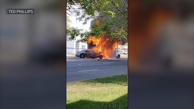 Video shot by NBC 5 viewer Ted Phillips shows a vehicle engulfed in flames after it fled a suburban traffic stop on May 10. 
