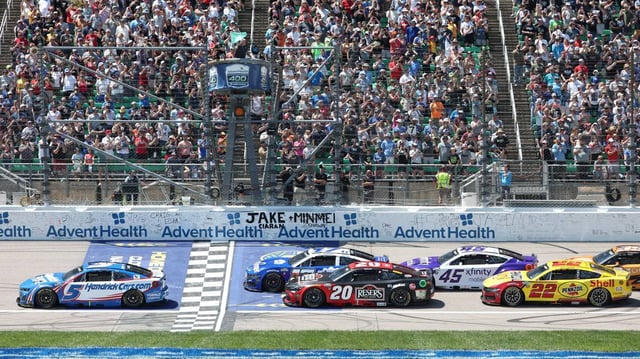 NASCAR Cup Series driver Kyle Larson leads the pack early in the Sunday, May 11, 2025 AdventHealth 400 auto race at Kansas Speedway in Kansas City, Kan.
