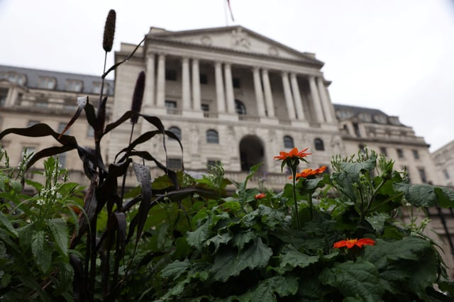 Flowers grow outside the Bank of England in the City of London, Britain, July 30, 2023. REUTERS/Hollie Adams/File Photo