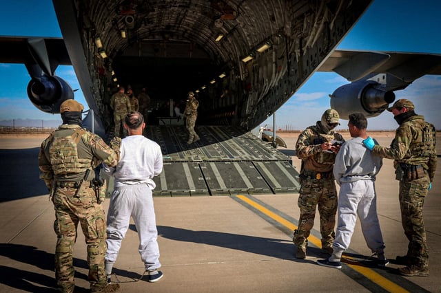 The first U.S. military aircraft to carry detained migrants to a detention facility at Guantanamo Bay, on Feb. 4, 2025.