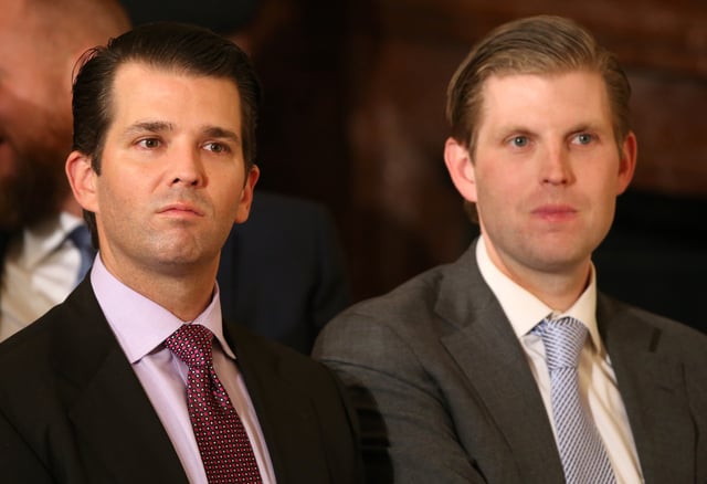 U.S. President Donald Trump's sons Donald Trump Jr. (L) and Eric Trump sit in the audience waiting to watch their father announce his nominee for the  empty associate justice seat at the U.S. Supreme Court, at the White House in Washington, D.C., U.S. January 31, 2017.  REUTERS/Carlos Barria/File Photo