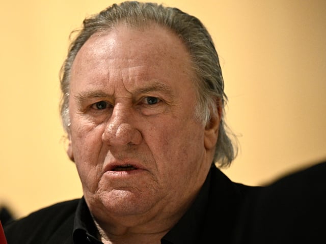 French actor Gerard Depardieu arrives on the fourth day of his trial in which he is charged with sexually assaulting two women during a film shoot in 2021, at the Paris criminal court in the Tribunal de Paris courthouse, on March 27, 2025. Depardieu, 76, who has made more than 200 films and television series, has been accused of improper behaviour by around 20 women but this is the first case to come to trial. The two plaintiffs -- Amelie, 54, a set dresser, and Sarah (name changed), 34, an assistant director -- allege sexual assault during the filming in 2021 of "Les Volets Verts" ("The Green Shutters") by director Jean Becker. (Photo by JULIEN DE ROSA / AFP)