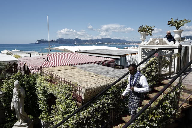A views shows a private beach with the Bay of Cannes in the background as preparations continue on the French Riviera before the start of the 78th Cannes Film Festival in Cannes, France, May 12, 2025. REUTERS/Benoit Tessier