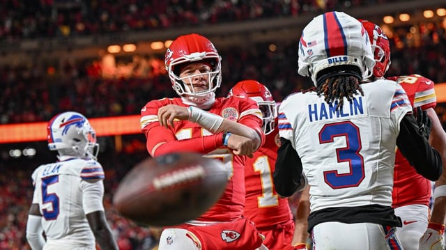 Kansas City Chiefs quarterback Patrick Mahomes (15) throws the ball down after running in for a touchdown in the second quarter against the Buffalo Bills during the AFC Championship Game on Sunday, Jan. 26, 2025, at GEHA Field at Arrowhead Stadium.
