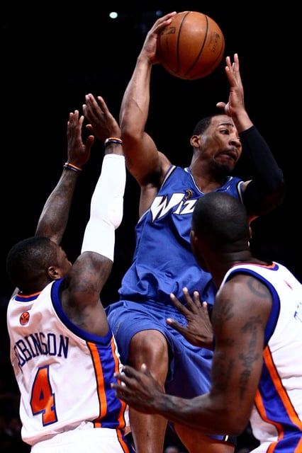 Javaris Crittenton (8) of the Washington Wizards looks to pass under pressure from Nate Robinson (4) of the New York Knicks at Madison Square Garden January 14, 2009 in New York City.