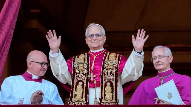 The newly elected Pontiff, Pope Leo XIV is seen for the first time from the Vatican balcony on May 8, 2025 in Vatican City, Vatican.