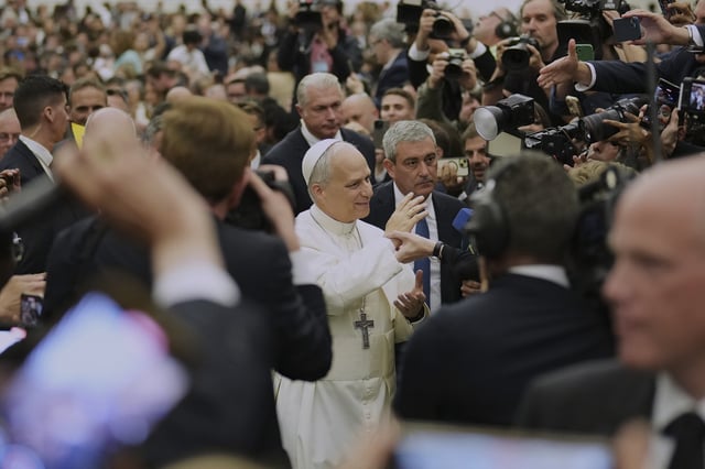 Pope Leo XIV meets members of the international media in the Paul VI Hall at the Vatican, Monday, May 12, 2025. (AP Photo/Andrew Medichini)