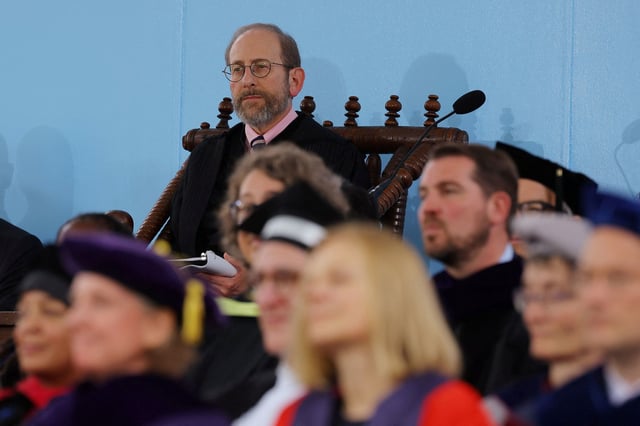 Harvard's interim president Alan Garber attends the university's 373rd commencement exercises.