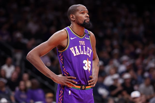 PHOENIX, ARIZONA - MARCH 30: Kevin Durant #35 of the Phoenix Suns looks on during the second half against the Houston Rockets at PHX Arena on March 30, 2025 in Phoenix, Arizona.