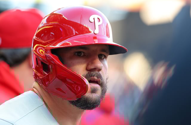 ATLANTA, GEORGIA - APRIL 09: Kyle Schwarber #12 of the Philadelphia Phillies stands in the dugout prior to facing the Atlanta Braves at Truist Park on April 09, 2025 in Atlanta, Georgia. (Photo by Kevin C. Cox/Getty Images)