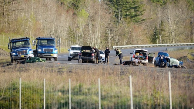 RCMP collision reconstruction officers on Sunday morning at the scene of the crash.