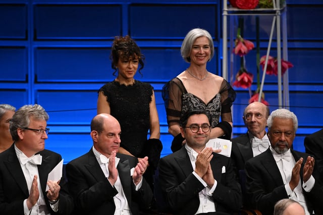 Biochemist Jennifer Doudna, left, and French scientist Emmanuelle Charpentier are honored at the Nobel Prize ceremony in 2022.