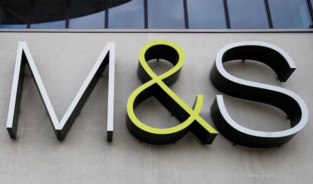 A Marks and Spencer (M&S) logo is seen on the outside of a store in Cheshire, Britain  August 18, 2020. REUTERS/Jason Cairnduff/File Photo