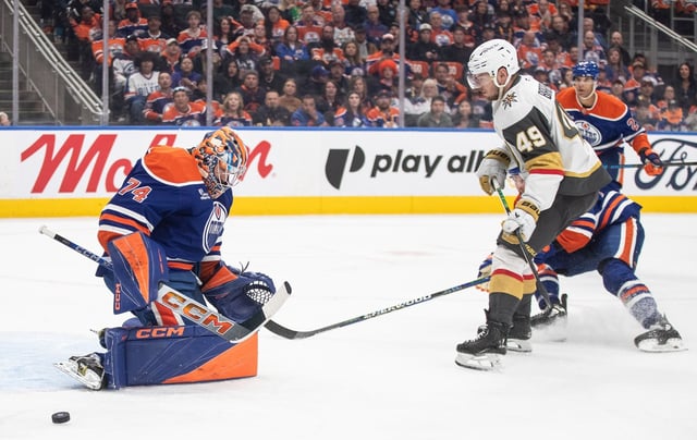 Vegas Golden Knights' Ivan Barbashev (49) is stopped by Edmonton Oilers goalie Stuart Skinner (74) during first period round 2, game 4 NHL Stanley Cup playoff action in Edmonton, Monday, May 12, 2025. THE CANADIAN PRESS/Jason Franson