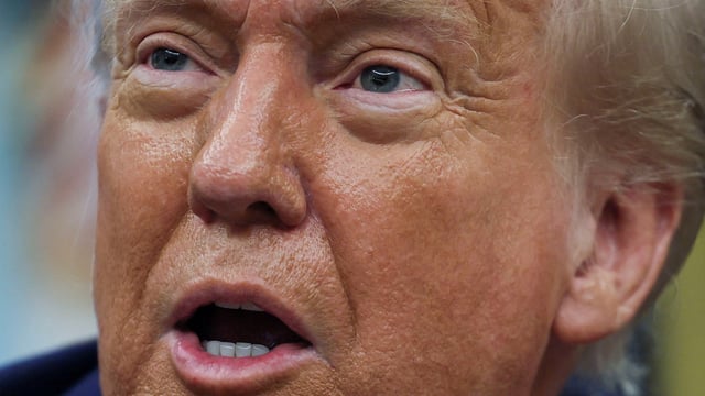 FILE PHOTO: U.S. President Donald Trump makes an announcement about a trade deal with the U.K., in the Oval Office at the White House in Washington, D.C., U.S., May 8, 2025. REUTERS/Leah Millis/File Photo