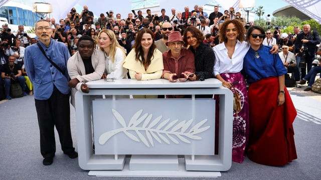 Juliette Binoche, Jury President of the 78th Cannes Film Festival and Jury members Carlos Reygadas, Payal Kapadia, Leila Slimani, Halle Berry, Jeremy Strong, Dieudo Hamadi, Alba Rohrwacher and Hong Sang-soo pose during a photocall before the opening ceremony of the 78th Cannes Film Festival in Cannes, France.