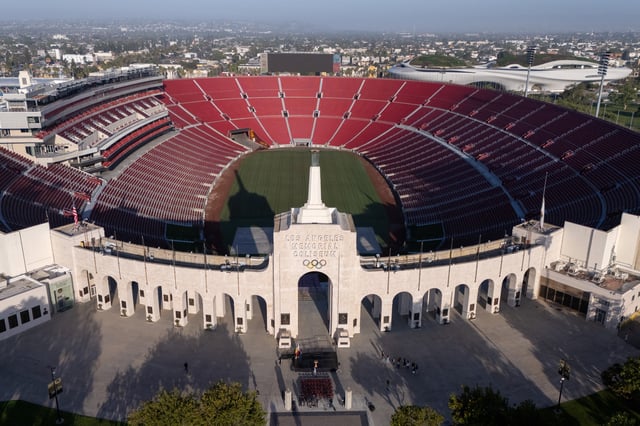 A drone view of Los Angeles Coliseum, as it was announced it will host the opening ceremonies of the 2028 Olympics along with SoFi Stadium in a dual event, closing ceremony, and host the opening of the Paralympic Games in 2028, making it the first facility to host events for 3 Olympic Games in Los Angeles, California, U.S., May 8, 2025. REUTERS/Mike Blake