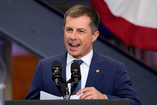FILE - Transportation Secretary Pete Buttigieg speaks before President Joe Biden during a visit to the U.A. Local 190 Training Center in Ann Arbor, Mich., Sept. 6, 2024. Buttigieg returns to Iowa Tuesday for an event focused on veterans, six years after he burst onto the national political stage with a strong run in the state's leadoff presidential caucuses. (AP Photo/Paul Sancya, File)