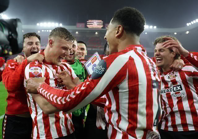 Championship - Play-Off - Semi Final - Second Leg - Sunderland v Coventry City - Stadium of Light, Sunderland, Britain - May 13, 2025 Sunderland's Jobe Bellingham and Daniel Ballard celebrate with teammates after the match Action Images/Lee Smith/File Photo