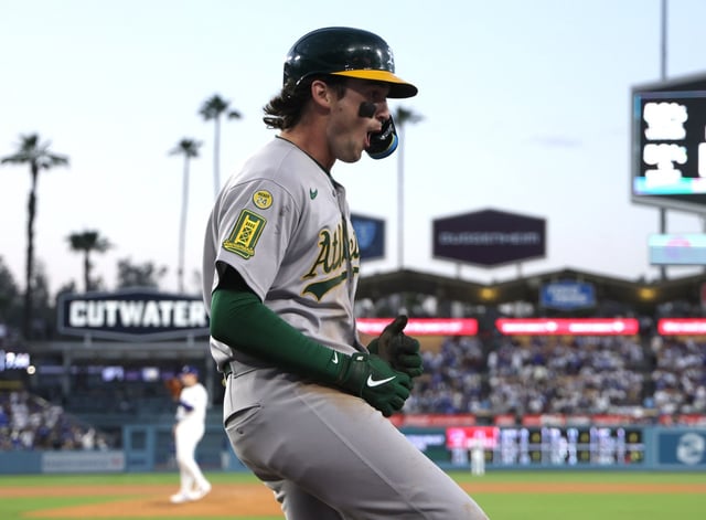Athletics rookie Jacob Wilson celebrates after hitting a two-run home run during the third inning of their game against the Dodgers on Tuesday night at Dodger Stadium. Wilson, a former Thousand Oaks High star, had two homers among his four hits as the A’s rolled to an 11-1 win. (Photo by Harry How/Getty Images)