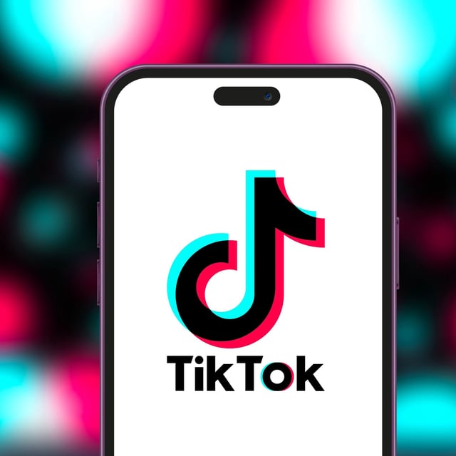 A phone showing the TikTok logo