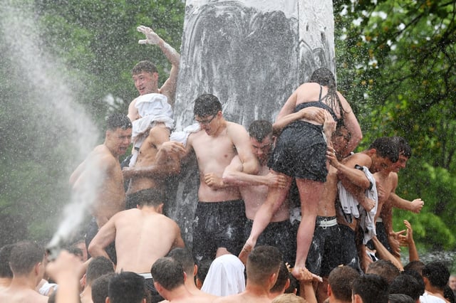 The plebes get to work. The Naval Academy Class of 2027 completed the Herndon Monument Climb in a time of 2:19:11. (Paul W. Gillespie/Staff photo)
