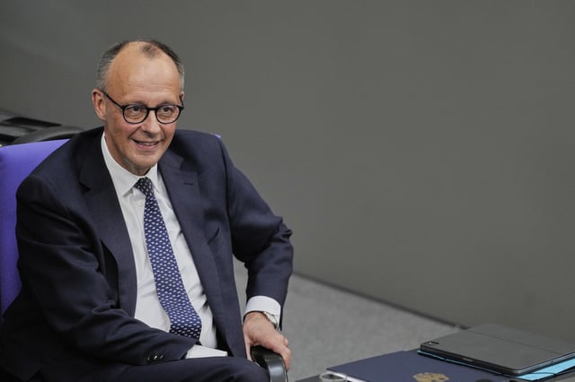 German Chancellor Friedrich Merz attends a plenary sessionin the parliament in Berlin, Germany, Wednesday, May 14, 2025. (AP Photo/Markus Schreiber)