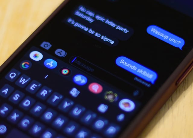 A fake text exchange using slang terms is shown in this photo illustration shot in Toronto on Thursday, Aug. 15, 2024. 