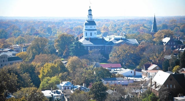 The State House as seen from the walkway around the top of the dome of the United States Naval Academy Chapel.