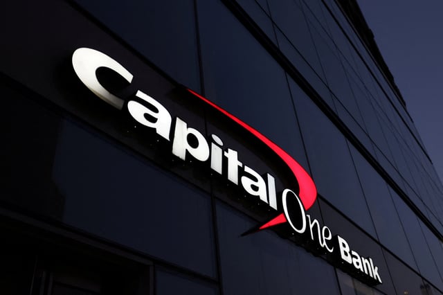 Signage is seen outside a Capital One Bank in Manhattan, New York, U.S., November 12, 2021. REUTERS/Andrew Kelly/File Photo