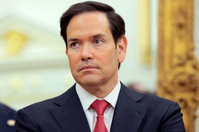 Secretary of State Marco Rubio listens as US President Donald Trump speaks during a swearing-in ceremony for Special Envoy to the Middle East Steve Witkoff in the Oval Office at the White House on May 6 in Washington, DC.