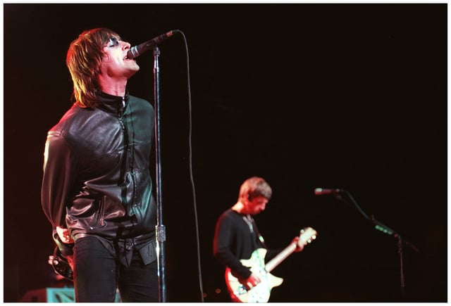 Oasis manager Alec McKinlay and frontman Liam Gallagher have issued opposing statements on the future of the British rock band.