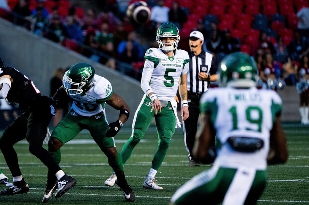 Saskatchewan Roughriders quarterback Shea Patterson (5) passes to wide receiver Samuel Emilus (19) during the first half of CFL action against the Ottawa Redblacks in Ottawa, on Thursday, Aug. 8, 2024. Patterson was among seven cuts the Bombers made on Wednesday