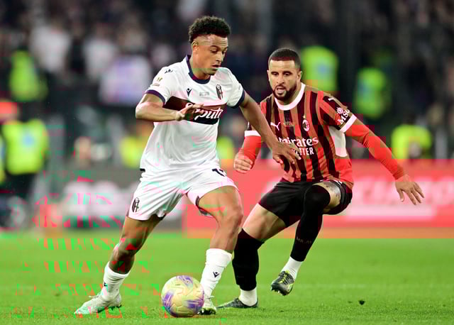 Soccer Football - Coppa Italia - Final - AC Milan v Bologna - Stadio Olimpico, Rome, Italy - May 14, 2025 Bologna's Dan Ndoye in action with AC Milan's Kyle Walker REUTERS/Daniele Mascolo