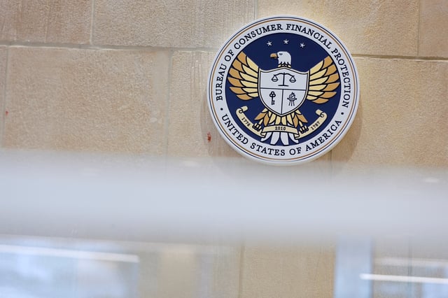 The seal of the Consumer Financial Protection Bureau (CFPB) is seen at their headquarters in Washington, D.C., U.S., May 14, 2021. REUTERS/Andrew Kelly/File Photo
