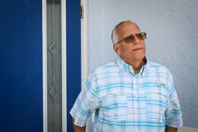 Louis Prevost, brother of newly elected Pope Leo XIV, Robert Prevost, looks on outside his home in Port Charlotte, Florida, on May 9, 2025.