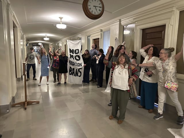 People in support of abortion rights protest outside the Missouri Senate chamber after the Senate voted to approve a referendum seeking to repeal an abortion-rights amendment on Wednesday, May 14, 2025, in Jefferson City, Missouri.