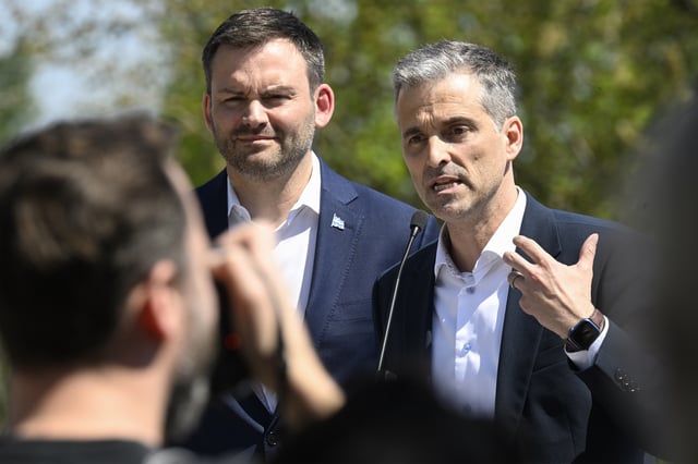 Former CBC radio show host Alex Boissonneault, right, speaks at a news conference to announce he will be candidate for the Arthabaska byelection, in St-Ferdinand Que., Wednesday, May 14, 2025.  Parti Quebecois Leader Paul St-Pierre Plamondon, left, looks on. 