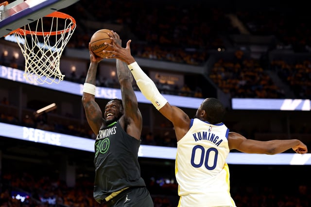 Julius Randle #30 of the Minnesota Timberwolves dunks the ball against Jonathan Kuminga #00 of the Golden State Warriors during the fourth quarter in Game Three of the Western Conference Second Round NBA Playoffs at Chase Center on May 10, 2025 in San Francisco, California.