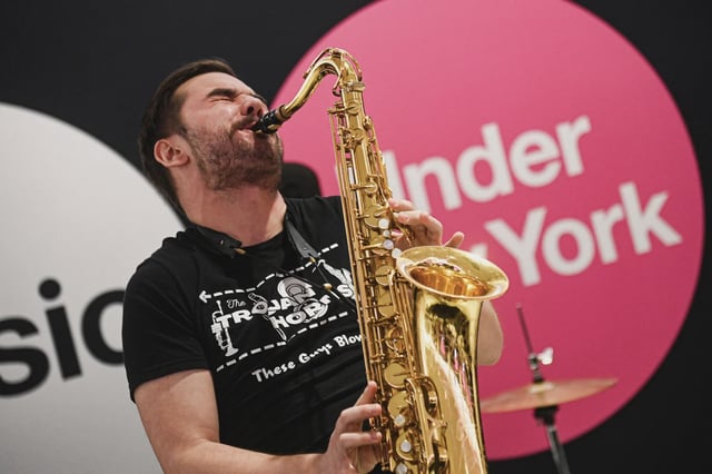 Playing the tenor sax during the 35th annual Music Under New York auditions.