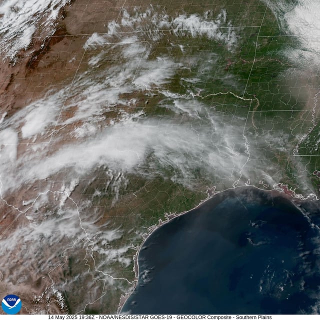 This NOAA weather satellite image taken Wednesday shows partly cloudy skies across Texas. Despite the clouds, many cities in the state reported triple-digit temperatures.