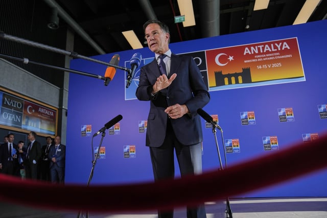 NATO Secretary General Mark Rutte talks to journalists as he arrives for NATO's informal meeting of foreign ministers in Antalya, southern Turkey, Thursday, May 15, 2025. (AP Photo/Khalil Hamra)