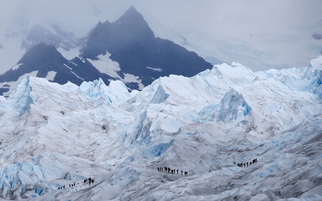 Climbers trek on the Perito Moreno glacier, near the city of El Calafate in the Patagonian province of Santa Cruz, Argentina January 14, 2020. REUTERS/Agustin Marcarian/File Photo