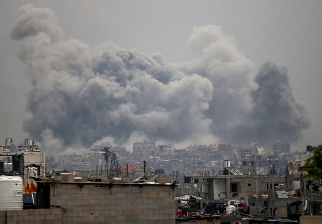 Smoke rises following Israeli strikes, in Jabalya in the northern Gaza Strip, May 15, 2025.